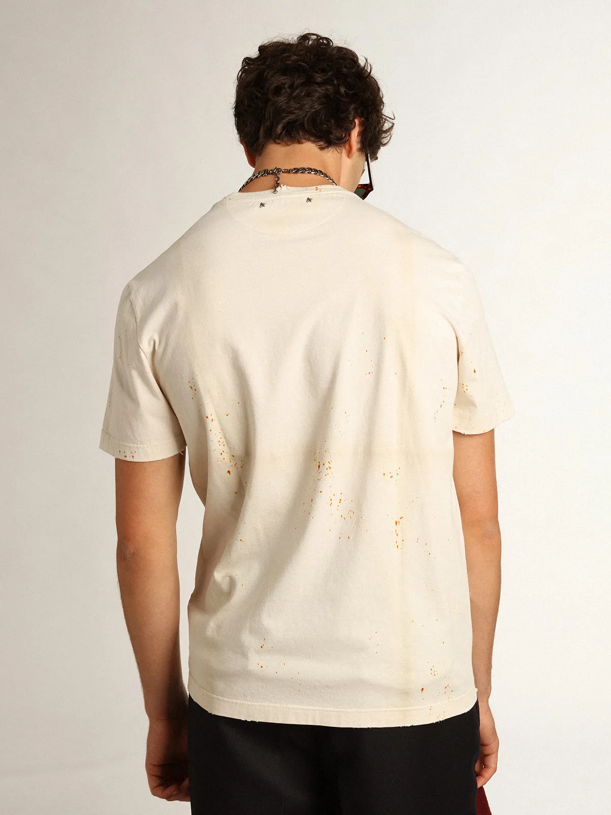 Men's bone white T-shirt with lettering and distressed details