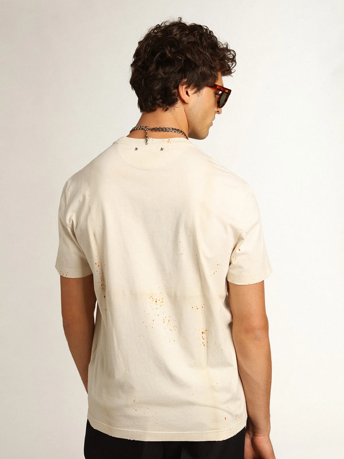 Men's bone white T-shirt with lettering and distressed details